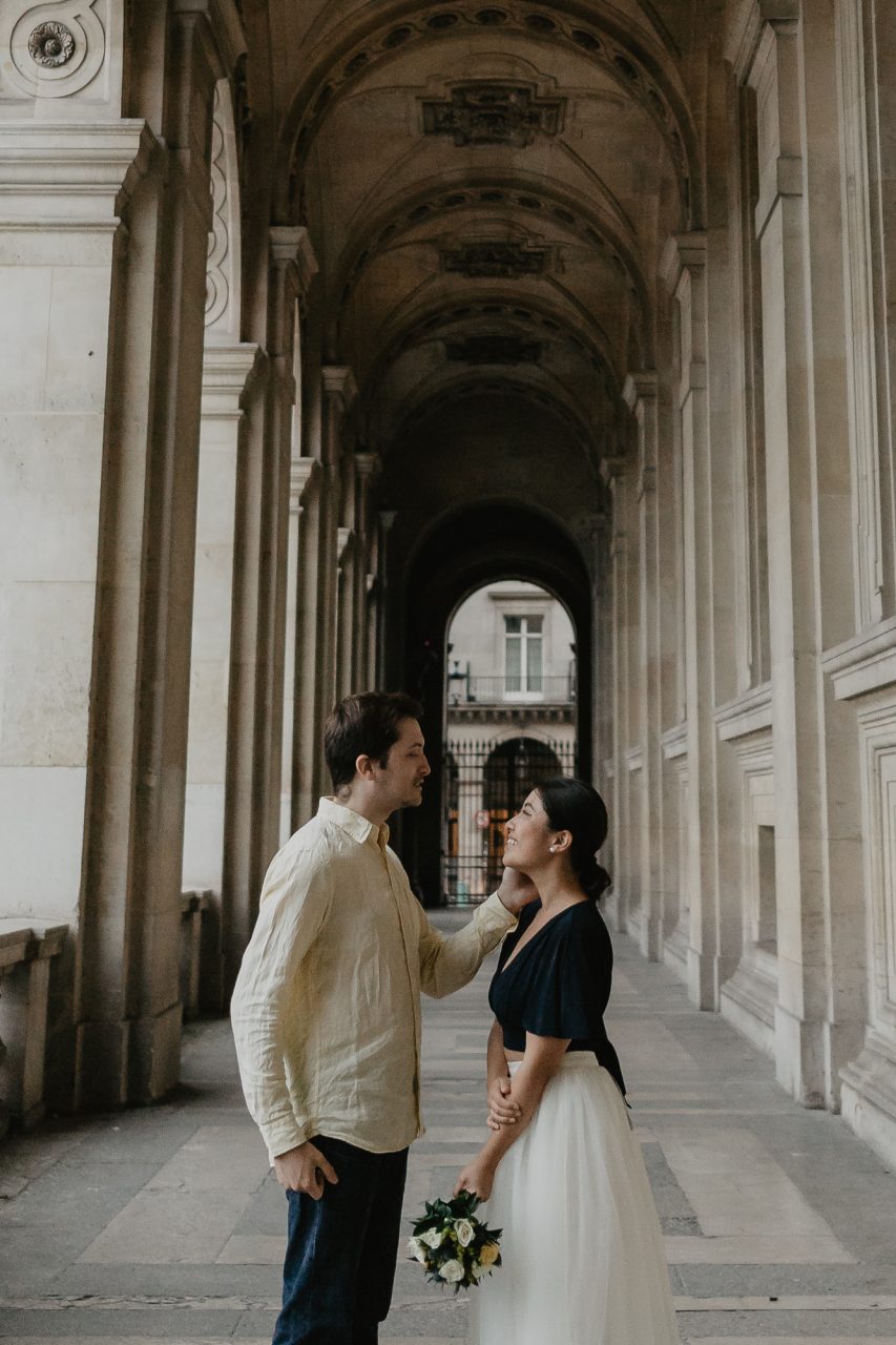 3Q1A2073-853x1280 Paris under the rain Weddings & Couples couple louvre couple paris rain Couple Photography in Paris elopement photography paris engagement photography paris in the rain pont du carrousel pre wedding paris rain paris Wedding Photographer in Paris
