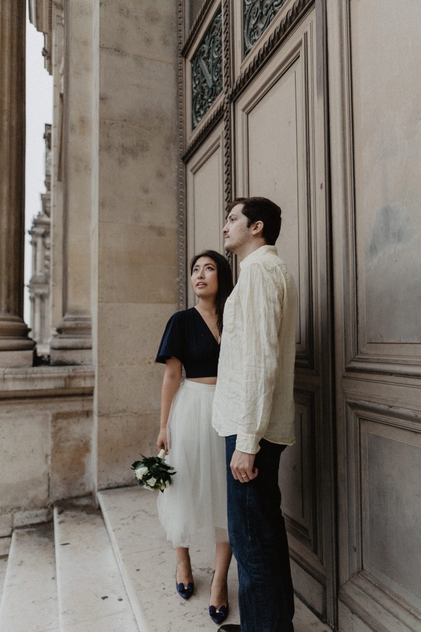 3Q1A2096-853x1280 Paris under the rain Weddings & Couples couple louvre couple paris rain Couple Photography in Paris elopement photography paris engagement photography paris in the rain pont du carrousel pre wedding paris rain paris Wedding Photographer in Paris