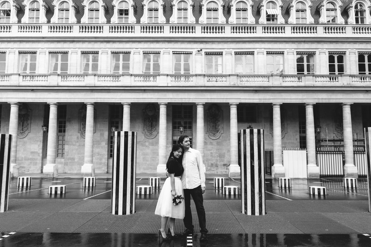 3Q1A2381-2-1280x853 Paris under the rain Weddings & Couples couple louvre couple paris rain Couple Photography in Paris elopement photography paris engagement photography paris in the rain pont du carrousel pre wedding paris rain paris Wedding Photographer in Paris