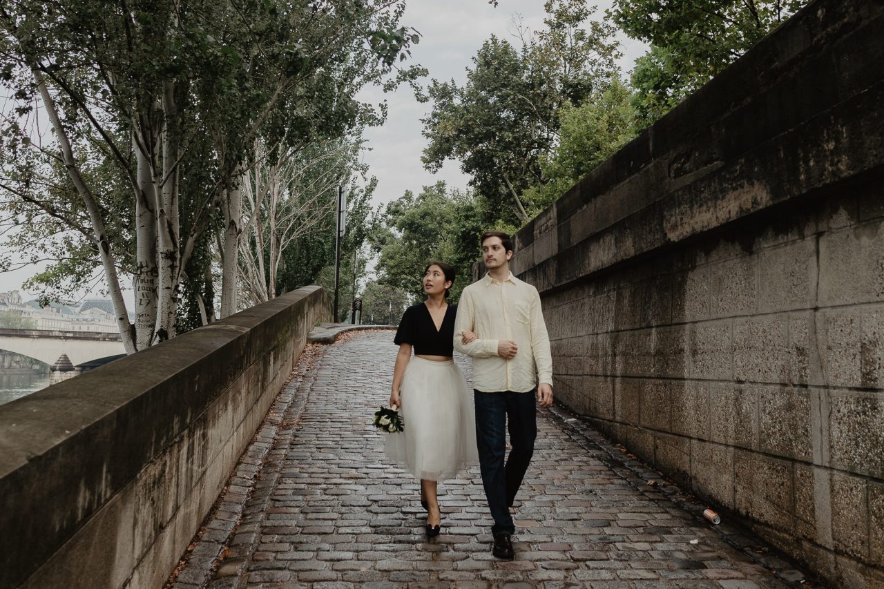 3Q1A2556-1280x853 Paris under the rain Weddings & Couples couple louvre couple paris rain Couple Photography in Paris elopement photography paris engagement photography paris in the rain pont du carrousel pre wedding paris rain paris Wedding Photographer in Paris
